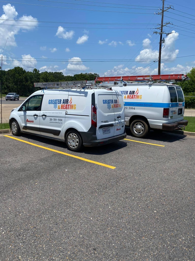 Greater Air & Heating service vans on a job in Pollock, LA